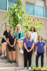 Nutrition students and program director stand in front of the Three Sisters garden, part of the new herb garden outside Cary hall on UB south campus.