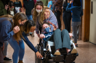 Students in an occupational therapy class, taught by James Lenker, explore different assistive technology through a variety of wheelchairs, at Diefendorf Hall in February 2022. Photographer: Douglas Levere