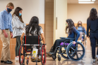 Students in an occupational therapy class, taught by James Lenker, explore different assistive technology through a variety of wheelchairs, at Diefendorf Hall in February 2022. Photographer: Douglas Levere