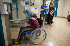 Testing a wheelchair-accessible drinking fountain in Kimball Hall. Photo: Meredith Forrest Kulwicki
