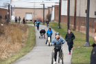 And down the stretch they come! UB architecture students test out their laufmaschines during a relay race in the Cleveland Flats area.