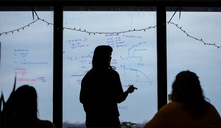 White board with numbers. 