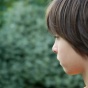 Young child staring in the distance. 