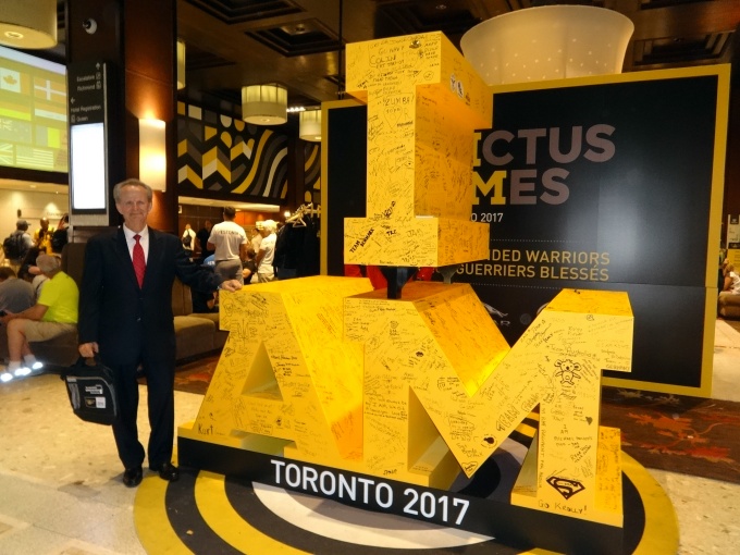 Joseph Lane at the Invictus Symbol in the Sheraton Lobby, signed by dozens of wounded warrior athletes from around the world. 