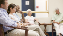 Clients sitting in a waiting room. 
