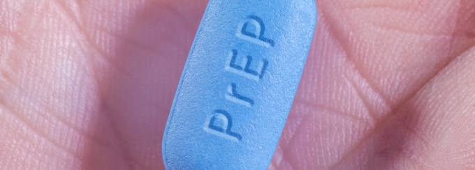 PrEP drug in hand. 