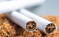 Three rolled cigarettes. 