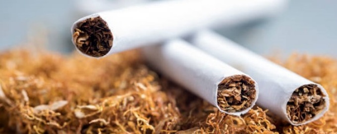 Three rolled cigarettes. 