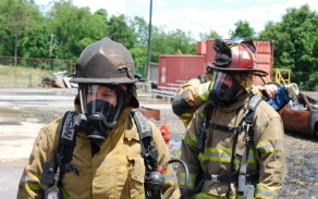 firefighters in gear. 
