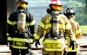 firefighters in gear. 