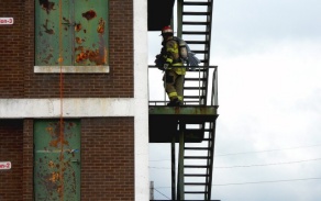 firefighters on escape stairs. 