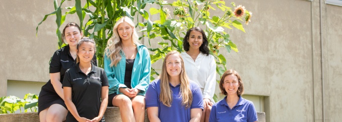 Nutrition students and (bottom right) Nicole Klem, program director, outside of their new raised-bed herb and vegetable garden on UB's South Campus. 