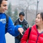 students walking across campus. 
