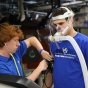 Exercise science students performing research in the lab. 