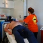 medical technician examining firefighter. 