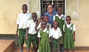 Art Goshin and children in Uganda. 