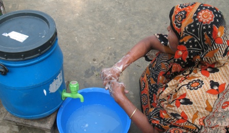 Bangladesh woman hand washing. 