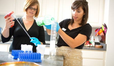 Assistant Professor Jennifer Temple, left, in her Department of Exercise and Nutrition Sciences Lab in Farber Hall. 