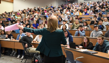 Photo of Dr. Krueger lecturing in front of Public Health class. 
