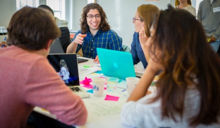 Students working together at the Global Innovation Challenge Communities of Excellence Global Health Equity in Hayes Hall. 