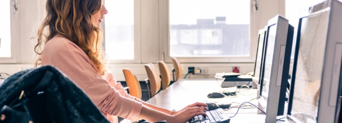Student at Computer. 