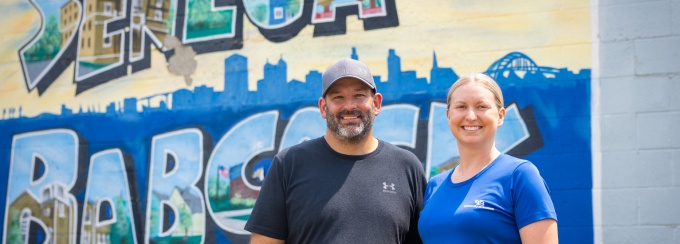 Photo of UB faculty with mommunity partner (Seneca Babcock). 