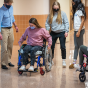 Students in an occupational therapy class, taught by James Lenker, explore different assistive technology through a variety of wheelchairs, at Diefendorf Hall in February 2022. 
