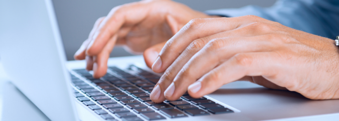 stock photo of keys at a laptop keyboard. 