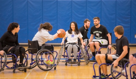 Rehabilitation Science class focused on adaptive sports basketball held in Alumni Arena. 