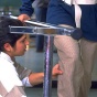 A female student assisting with a physical therapy technique. 